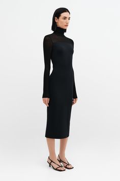 Beautiful simplicity. Our Marina is an elegant but subtly arresting turtleneck black midi dress with a turtleneck, European sheer jersey neckline, and extra long sleeves. This long sleeve turtleneck midi dress is fashioned from our softer, structured, mid-stretch European ponte for a body-hugging fit. We recommend wearing Marina with a strapless bra.[SPLIT] Emily is 5'9.5" (177 cm) tall, wearing size XS. Sam is 5'8" (173 cm) tall, wearing size XS. Total length approximately 50" (127cm). European Stretch Turtleneck Midi Dress For Party, Sleek Turtleneck Dress For Fall, Fall Midi Dress With Sheer Sleeves, Evening Turtleneck Dress, High Neck Solid Color Midi Dress For Formal Occasions, Formal High Neck Midi Dress In Solid Color, High Neck Midi Dress For Formal Occasions, High Neck Midi Dress For Formal Events, Elegant Turtleneck Stretch Dress