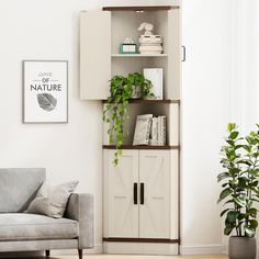 a living room with a couch, chair and bookshelf