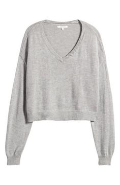 Give your off-duty fits a cozy boost in this cropped, boxy sweater made with a touch of wool for enhanced warmth. 19" length (size Medium) V-neck Long sleeves Dropped shoulders Ribbed cuffs and hem 50% nylon, 25% polyester, 15% acrylic, 10% wool Machine wash, dry flat Imported Cozy Cropped Relaxed Fit Sweater, Cozy Cropped Sweater With Relaxed Fit, Cozy Relaxed Fit Cropped Sweater, Casual V-neck Cropped Sweater For Loungewear, Casual Cropped Sweater For Layering, Knit Cropped Sweater For Loungewear, Casual Cropped Sweater With Ribbed Cuffs, Cropped Knit Sweater For Loungewear, Casual Soft Knit Crop Top For Fall