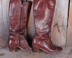 "These are amazing. Leather Dingo brand boots from the 70's. Get that Jane Fonda in Klute look in now time. The details: This is a vintage pair of Dingo brand women's tall leather boots with zipper sides. Normal wear, no damage, will be polished. Marked a 7M. Measure 16\" tall from the ball of the foot to the top of the booth. Heels are 2 1/2\" tall. Brass buckle accents. These will be polished when you receive them. These boots will come carefully packaged and wrapped in bubble wrap so they're Brown Boots Heels, Jane Fonda Klute, Leather Boots Women Tall, Fashion Thoughts, Tall Leather Boots, Jane Fonda, Boots Heels, Ladies Shoes, Brass Buckle