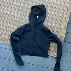 Never Worn Fitted Athleisure Windbreaker For Outdoor, Fitted Functional Windbreaker For Fall, Functional Fitted Fall Windbreaker, Fitted Functional Fall Windbreaker, Sporty Fitted Black Windbreaker, Hooded Nylon Activewear For Fall, Nylon Long Sleeve Athleisure Hoodie, Functional Fitted Hooded Windbreaker, Fitted Hooded Windbreaker