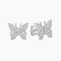 These stunning Sterling Silver Butterfly Stud Earrings feature a beautiful pave design that sparkles and shines in the light. The delicate butterfly shape adds a touch of whimsy and femininity to any outfit, making them the perfect accessory for any occasion. The intricate pave design showcases the beauty and detail of the piece, making it a must-have for any jewelry collection. Butterfly Cubic Zirconia Earrings For Formal Events, Butterfly Cubic Zirconia Earrings For Formal Occasions, Butterfly-shaped Cubic Zirconia Earrings For Formal Occasions, Formal Butterfly Cubic Zirconia Earrings, Formal Butterfly-shaped Cubic Zirconia Earrings, Butterfly Charm Cubic Zirconia Earrings, Butterfly Shaped Earrings With Diamond Accents, Elegant Butterfly Earrings With Diamond Accents, Silver Cubic Zirconia Butterfly Earrings