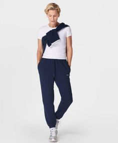 A relaxed new take on our elevated sweatpants. Made from a soft and breathable French terry cotton blend. Loose fit with sporty side panel stitching. Elasticated cuffs and a drawcord at the waist  . Two side pockets. Inseam length: 71.5cm /  28”. Model wears size S and is 178cm/5'10" tall. Style Code: SB9915Colour: Navy Blue Athleisure Sweatpants With Drawstring For Workout, Athleisure Sweatpants With Drawstring For Sports, Athleisure Drawstring Sweatpants For Workout, Sporty Joggers With Ribbed Waistband For Loungewear, Sporty Sweatpants With Ribbed Waistband For Loungewear, Athleisure Sweatpants With Elastic Cuffs And Straight Hem, Sporty Relaxed Fit Sweatpants With Ribbed Cuffs, Athleisure Sweatpants With Elastic Side Panels, Sporty Sweatpants With Ribbed Cuffs And Relaxed Fit