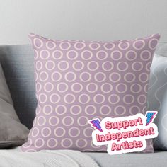 a pillow with the words support independent artists on it