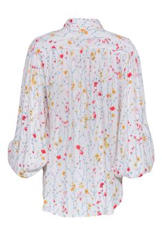 If you love flowers and a good pop of color, then you will love this long-sleeved blouse by Equipment! This dainty and organic print features puff sleeves and is very lightweight. Get your friends together and go to the flower show! Style this blouse by pairing with skinny jeans and lace up booties. Size L 100% Rayon Unlined Button down closure Relaxed silhouette Collared neckline Long sleeved Bust 40" Waist 42" Shoulder to hem 27" Sleeve length 25" White Floral Print Long Sleeve Blouse, Cotton Blouse With Gathered Sleeves For Spring, Spring Cotton Blouse With Lantern Sleeves, Feminine Bishop Sleeve Tops For Spring, Multicolor Puff Sleeve Blouse For Spring, Spring Multicolor Puff Sleeve Blouse, Floral Print Long Sleeve Puff Sleeve Top For Brunch, Daywear Floral Print Blouse With Bishop Sleeves, Spring Long Sleeve Blouse With Gathered Sleeves