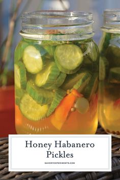 honey habanero pickles in mason jars with text overlay reading honey habanero pickles