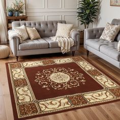 a living room with two couches and a rug