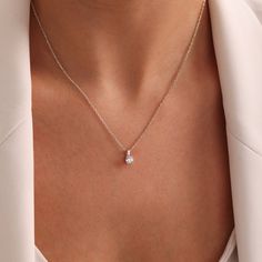 DAINTY - DIAMOND - NECKLACE Elegance meets simplicity with our Dainty Diamond Necklace. This floating diamond solitaire pendant exudes timeless beauty, perfect for weddings, anniversaries, or as a thoughtful gift for her. Delicately crafted to adorn any neckline, it's a versatile piece that adds a touch of sophistication to any occasion. Whether for bridesmaids, brides, or to celebrate Mother's Day, this minimalist necklace is sure to dazzle and delight. Shop now and add a touch of sparkle to yo Wedding Silver Diamond Necklace With Birthstone, Delicate Chain Birthstone Necklace For Wedding, Dainty Pendant Necklace For Bridesmaids, Anniversary Crystal Pendant Necklace, Delicate Chain Pendant Necklace For Bridesmaid Gift, Elegant Diamond White Crystal Necklace As Gift, Elegant Diamond White Crystal Necklace For Gift, Elegant Diamond White Crystal Necklace Gift, Delicate Pendant Necklace For Bridesmaid Gift