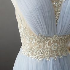 Embrace timeless elegance with our Elegant Light Blue Pretty Sequin Dress. This chiffon evening gown, featuring a high neck and an exquisitely embellished bodice, is designed to make you feel like a true queen. High Neck Sophistication: The high neck design exudes grace and sophistication, perfect for formal events and special occasions. Embellished Bodice: The bodice is adorned with intricate sequin embellishments, adding a dazzling sparkle that catches the light beautifully. Flowing Chiffon Skirt: The light blue chiffon fabric cascades gracefully, creating a soft, ethereal silhouette that moves with you. This gown offers both beauty and comfort, with a design that enhances your natural curves. Available in plus sizes, it measures approximately 150 cm (59 inches) from shoulder to hem, pro Blue Tulle Evening Dress With Lace Bodice, Embellished Light Blue Evening Dress For Prom, Sheer Back Floor-length Evening Dress For Wedding, Light Blue Embellished Evening Dress For Prom, Light Blue Embellished Dress For Prom Season, Blue Illusion Neckline Dress For Wedding, Illusion Neckline Organza Evening Dress, Floor-length, Organza Evening Dress With Illusion Neckline, Floor-length, Floor-length Organza Evening Dress With Illusion Neckline