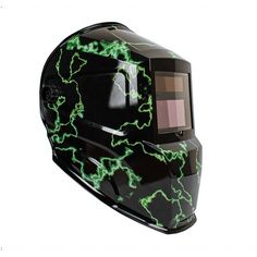 a black helmet with green lightning on the side and a lightening effect painted on it