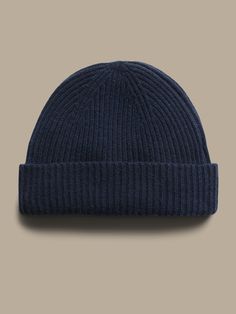 Inspired by fisherman's hats from the turn of the century, this luxuriously soft and warm cashmere beanie is designed in a shorter length so it sits higher up.  Ribbed knit design adds softness and a luxe texture.  Length: 9. 25" (23. 5cm) Classic Cashmere Soft Knit Hat, Classic Wool Hat With Soft Knit, Classic Fitted Beanie For Cold Weather, Classic Knitted Beanie For Fall, Classic Cashmere Winter Hat, Classic Soft Knit Hat For Fall, Classic Wool Soft Knit Hat, Classic Fitted Knitted Beanie, Classic Beanie Hats For Fall