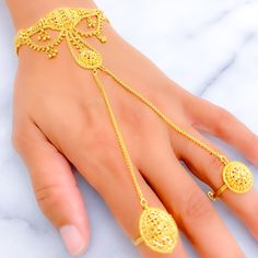 Intricate Posh Two Ring 22K Gold Panchangala Gold-plated Bracelets With Intricate Design, Luxury 22k Gold Ceremonial Bracelet, 22k Gold Chandbali Bracelets, Yellow Gold Chandbali Bracelet As A Gift, Gold Plated Bracelet With Intricate Design, Elegant Adjustable 22k Gold Bangle, Gold-plated Bracelet With Intricate Design, Yellow Gold Toe Ring With Intricate Design, Intricate Yellow Gold Toe Ring