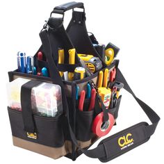 a tool bag filled with lots of tools and construction supplies on it's side