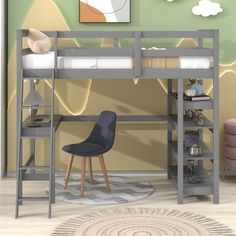 a loft bed with desk underneath it in a room that is painted green and yellow