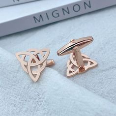 Elevate his style with our Viking Cufflinks in Stainless Steel, intricately designed with Eternal Celtic Knots. Perfect for weddings, these luxurious cufflinks are available in Gold, Rose Gold, or Silver, making them an ideal designer gift for your husband. Authentic craftsmanship meets timeless elegance. Discover Personalized Perfection Explore our collection of personalized cufflinks, featuring unique custom and engraved designs perfect for weddings and special occasions. Our sterling silver c Husband Clothes, Wedding Cuff Links, Personalized Cufflinks, Celtic Knots, Sterling Silver Cufflinks, Cufflinks Wedding, Charm Making, Gift For Husband, Silver Cufflinks