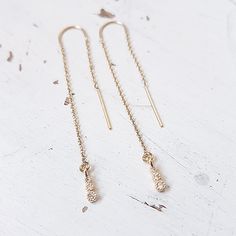 Threader Earrings Gold,Long Threader Earrings,CZ Threader Earrings,Dangling Diamond Ear Threads,Dainty,CZ Dangling Earrings,14kt Gold Filled A beautiful stunning gold filled chain threader dangle earrings with tiny CZ charm. Fantastic look! Simple and stunning trendy earring . All my jewelry are packed in an elegant gift box. If you want to give it as a gift you can specify the address and I'll be happy to send it on your behalf. More beautiful earrings: https://www.etsy.com/listing/124702911/go Diamond Thread Earrings, Hoco Jewelry, Earrings Gold Long, Formal Earrings, Gold Chain Earrings, Threader Earrings Gold, Earrings Dangling, Minimal Earrings, Silver Earrings Handmade