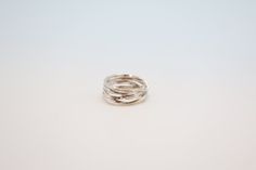 Indulge in luxury with our Weave Ring, handcrafted by Plata. This stunning silver ring features a delicate weaving design, adding a touch of sophistication to any ensemble. Elevate your style and make a statement with our exclusive piece. Silver Stackable Rings With Modern Twist For Wedding, White Modern Twist Ring Jewelry, Handmade White Gold Elegant Rings, Handmade Elegant White Gold Rings, Elegant Sterling Silver Midi Rings In Silver, Modern Twist White Gold Jewelry With Ring Detail, Elegant White Sterling Silver Midi Rings, Modern Handmade Wedding Jewelry, Sterling Silver Jewelry With Ring Detail, Modern Twist