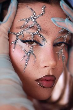 #makeupeditorial #glowingmakeup #editorialmakeup #makeupdolls #crystalmakeup #beautyeditorial  #glammakeup #aestheticmakeup #graphicliner #eyemakeup #eyeliner Lightning Makeup Look, Make Up With Crystals, Crystal Makeup Look, Lightning Makeup, Siren Costume, Funky Makeup