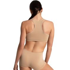 Confidence is effortless in the Seamless Sports Bra. This double-layered sports bra offers smooth coverage and support when worn under layers. Perfect for under dancewear and clothing, this bra features strategically placed ribbing for a secure, contoured, and comfortable fit to the body. Available in adult and tween sizes. Stretch T-back Sports Bra With Built-in Bra, Stretch T-back Sports Bra With Built-in Padding, Seamless Stretch T-back Sports Bra, Racerback Training Bra With Medium Bust Support, Stretch Racerback Bra With Built-in Support, Training Bra With Medium Bust Support, Racerback, Stretch Racerback Bra With Built-in Bra, Sports Bra In Seamless Fabric, Sports Bra With Built-in Stretch