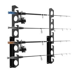 four fishing rods are attached to the wall with hooks on each rod and two reels hanging from them