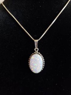 *10x14mm Oval white Opal Necklace *Lab Created Opal *Sterling Silver *Free Shipping *Handcrafted In USA *Jewelry ship in Gift box *Necklace length: 18 inches or 20”*Cabochon may vary in color *Lovely necklace with a pendant on a sterling silver chain with spring ring closure, this necklace is so pretty . A must for any occasion .Thank You For Looking ,And Check Out More Items In My Etsy Shop For More Great Deals, Also We Add More Jewelry To Etsy Shop Regularly https://www.etsy.com/shop/Turquoise Box Necklace, Usa Jewelry, Necklace Box, Lovely Necklace, Opal Necklace, White Opal, Necklace Handmade, Sterling Silver Chain, Spring Rings