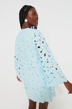 Make a graceful statement in the Aqua Floral Lace Camilla Dress. A mini crafted from embroidered fabric with cut-out details, this feminine style has flirty details such as the unlined long sleeves and scalloped hem. Perfect for warm-weather brunches, bridal showers, and luncheons, this stunning number pairs nicely with simple heels and jewelry. Round neck Unlined long bell sleeves Back zip closure Shift silhouette Scalloped hem Embroidered fabric with cut-out detail Mini length Lined Material: Blue Scalloped Lace Mini Dress For Spring, Blue Mini Dress With Scalloped Lace For Spring, Long Sleeve Mini Dress With Scalloped Lace For Brunch, Spring Mini Dress With Cutwork Hem, Chic Long Sleeve Mini Dress With Scalloped Lace, Elegant Long Sleeve Dress With Cutwork Hem, Spring Brunch Dresses With Scalloped Edges, Spring Brunch Dress With Scalloped Edges, Elegant Spring Dresses With Cutwork