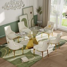 a dining room table with white chairs and gold trimmings on the glass top