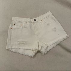 Like New Condition- Never Worn Without Tags White Everyday Short Bottoms, White Everyday Shorts, Everyday White Summer Shorts, White Cutoff Jean Shorts For Day Out, Levi's Cutoff Jean Shorts, Trendy White Jean Shorts For Everyday, White Jean Shorts For Everyday Wear, Levi's Cutoff Bottoms For Everyday Wear, Levi's Cotton Jean Shorts For Summer