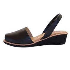 Introducing our comfiest midi wedges: a 1.75 inch wedge, a padded insole and a slightly larger toe area make for a very comfortable shoe Upper and insole made of leather, outsole made of rubber Fit: true to size to slightly large; size down if in between sizes Made in Spain Free shipping (4-6 business days) Casual Leather Wedge Sandals With Low Heel, Comfortable Wedge Sandals With Removable Insole And Round Toe, Comfortable Wedge Sandals With Rubber Sole And Round Toe, Comfortable Wedge Sandals With Rubber Sole, Leather Wedge Sandals With Round Toe For Everyday, Everyday Leather Wedge Sandals, Comfortable Slip-on Wedge Sandals With Ortholite Insole, Classic Sandals With Ortholite Insole And Round Toe, Everyday Leather Closed Toe Wedge Sandals