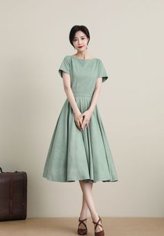 Classic Cotton Dresses With Pockets, Classic Cotton Dress With Pockets, Classic Green Cotton Dress, Vintage Green Dress With Pockets, Vintage Midi Dress With Pockets, Vintage Midi-length Dresses With Pockets, Vintage A-line Dresses With Pockets, Vintage A-line Dress With Pockets, Vintage Knee-length Dresses With Pockets