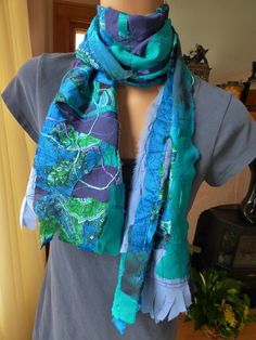 This unique shabby chic art scarf is an original creation by Yasmin. Strips of hand dyed silk, found silk, embroidery floss and other elements are combined to make this one of a kind scarf.  Up cycled and created fabrics are used.A perfect gift for the art lover or art teacher. My mother was a master seamstress and she made beautiful quilts as well as all of our clothes and her own. I never wanted to sew. I was more interested in drawing and painting and I followed that route. When she passed aw Green Hand Dyed Bohemian Scarf, Bohemian Handmade Silk Scarves, Handmade Silk Bohemian Scarf, Handmade Silk Bohemian Scarves, Bohemian Hand-dyed Silk Scarf, Shabby Chic Art, Unique Scarf, Art Scarves, Chic Art