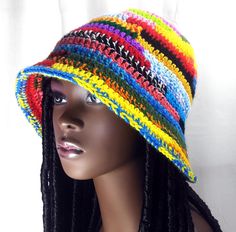 Stay stylish and colorful with this trendy multi-color bucket hat! Add a pop of excitement to any outfit. Whether you're heading to the beach, a festival, or just running errands around town, this hat will keep you looking cool and fashionable.  Stand out from the crowd with this vibrant and versatile accessory that will quickly become a staple in your wardrobe. Perfect for any season, this multi-color bucket hat is a must-have for anyone looking to add some fun and flair to their look! One size Multicolor Bucket Hat For The Beach, Multicolor Bucket Hat For Beach, Colorful Spring Bucket Hat, Adjustable Rainbow Hat For Festivals, Casual Multicolor Brimmed Hat, Trendy Multicolor Bucket Hat For Summer, Multicolor Bucket Hat For Vacation, Casual Colorful Bucket Hat, Casual Colorful Summer Bucket Hat