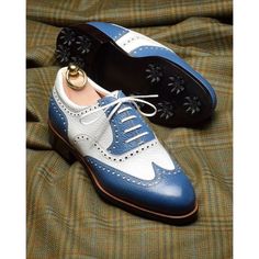 Elevate your shoe game with these bespoke leather handmade shoes. Made with genuine leather, these oxfords come in blue & white, and are available in all US, UK, EU, and AU sizes. The comfortable insole and standard shoe width make them perfect for any occasion. Designed with a solid pattern and lace-up closure, these handmade shoes are a vintage addition to any wardrobe. The leather outsole adds durability and longevity to these unique boots. Customize them to your liking with personalization options available. Get ready to step out in style with these one-of-a-kind handmade leather shoes. Classic Blue Oxfords With Brogue Detailing, Classic Blue Wingtip Oxfords, Blue Wingtip Oxfords, Blue Cap Toe Oxfords For Derby, Classic Blue Round Toe Oxfords, Blue Wingtip Oxfords With Rubber Sole, Blue Oxfords With Rubber Sole For Derby, Blue Oxfords With Leather Sole For Derby, Blue Wingtip Leather Shoes With Rubber Heel Cap