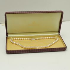 Mikimoto Sterling silver Pearl Necklace with Box Pearl The necklace is 15 inches in Length Pearls are white cream-colored pearls are 6.9 Comes with Box Item Number 1089 Classic Silver Pearl Necklace With 17 Jewels, Classic Single Strand Pearl Necklace Gift, Luxury White Pearl Necklace With Sterling Silver Clasp, Classic Single Strand Pearl Necklace As Gift, Classic White Pearl Necklace, Formal Silver Pearl Necklace, Classic Akoya Pearl Necklace As Gift, Classic Cream Pearl Necklace With Pearl Charm, Classic Cream Necklace With Pearl Chain