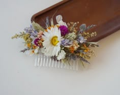 "Natural thistle lavender dry flower mixed bridal hair comb, Bohemian wedding hair accessories, mixed wild flower girl comb 🌿Approx. 5.5\" wide by 3.5\" tall 🌿Price as a comb Everlasting dried flower hair comb. Perfect for weddings, bridesmaids, brides, flower girls, engagement shoot, maternity shoot, showers. *Each arrangement is handmade to order. *Each arrangement is handmade with the same components however each of them are arranged slightly different. The colors and size may vary from one Bridal Combs For Hair, Dried Flower Hair Piece, Dried Flower Arrangements Wedding, Bohemian Wedding Hair Accessories, Bohemian Wedding Hair, Hairdo Wedding, Lavender Hair, Dry Flower, Flower Hair Comb