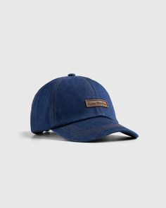 Shell is 100% cotton Lining is 65% polyester, 35% cotton Six-panel construction Top button Curved brim Adjustable back strap Logo patch at the front Denim Baseball Cap, Indigo Blue, Back Strap, Patch Logo, Design Elements, Baseball Cap, Caps Hats, Accessories Hats, Acne Studios