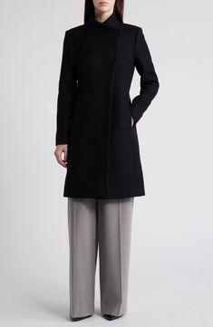 An asymmetric stand collar covers the button closure of this gorgeous wool-blend coat, creating a sleek silhouette that stops at a mid-thigh length. Hidden front-button closure Stand collar Lined 72% wool, 28% polyamide Dry clean Made in Turkey Stewart Weitzman, Lululemon Tops, The Button, Wool Blend Coat, Nordstrom Store, Fabric Gifts, Free Fabric, Black Fits, Winter Wardrobe