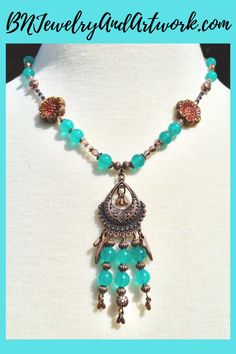 This boho copper beaded necklace is a beautiful blend of beads and so pretty I'm tempted to keep it for myself (haaa). It has lots of copper on it, four tree of life copper connector charms, two beautiful czech glass table cut flower beads, aqua glass beads, czech firepolish ab beads in three different colors and sizes and two different beautiful colors in light blue and rich purple-wine very tiny crystal bicone beads. Perfect for Valentine's Day gift for her or Mother's Day. Turquoise Chandelier, Chandelier Necklace, Copper And Turquoise, Necklace Tree, Aqua Glass, Purple Wine, Tree Necklace, Valentines Day Gifts For Her, Glass Flowers