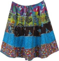 If you like tie-dye and colors, and looking for a fun summer short skirt, this is it! This bright and colorful skirt is sewn in five unique tiers of printed cotton, with five bright prints and then tie dyed in blue color. The elastic waistline allows for an adjustable fit, and the skirt is above the knee-length. Easy choice for a fun, special outing. A fun, attractive light-weight cotton voile skirt that has no lining. Length: 20" approx ; Waist: 24" - 34" (elastic waistband with drawstring, one Multicolor Tiered Hippie Skirt, Casual Multicolor Cotton Skirt, Hippie Cotton Mini Skirt For Spring, Multicolor Patchwork Summer Skirt, Summer Multicolor Vibrant Print Skirt, Multicolor Cotton Mini Skirt With Lining, Vibrant Cotton Skirt For Summer, Colorful Vibrant Summer Skirt, Multicolor Bohemian Mini Skirt