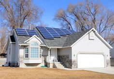 a house with solar panels on the roof