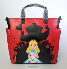 This is a Loungefly Disney Alice in Wonderland - Villains convertible crossbody bag.  This stunning bag is made with a durable faux leather that has a glitter red and solid black exterior.  It features a colorful Alice applique on the front pouch with embossed direction signs.  Around the pouch and on the sides pockets are silhouettes of the Queen of Hearts and her solders.  The bag can be carried by its faux leather handles, or over the shoulder with the detachable shoulder strap or worn as a b Red Disney Bag With Zipper Closure, Black Disney Bag For Theme Park, Black Disney-style Bag For Theme Park, Black Disney Style Bag For Theme Park, Red Themed Backpack Bag, Black Backpack For Theme Park, Disney Crossbody Bags For Disney Trips, Disney Style Crossbody Bags For Disney Trips, Disney Travel Bags With Detachable Strap