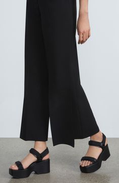 For pre-fall 2023, Lafayette 148 offers these contemporary pants immaculately tailored in a wide-leg, ankle-length silhouette from signature Finesse crepe. An overlay panels lends added drape and fluid movement, while neat creases at the front and back reinforce the smart appeal. 27" inseam; 25" leg opening; 11 1/2" front rise; 17" back rise (size 8) Zip fly Front slant pockets Unlined 71% acetate, 29% polyester Dry clean Imported Designer Clothing Wide-leg Culottes For Spring Evening, Spring Wide-leg Culottes For Evening, Spring Evening Wide-leg Culottes, Chic Straight Culottes For Evening, Spring Evening Ankle-length Wide Leg Pants, Chic Evening Straight Culottes, Modern Wide Leg Pants For Spring Formal, Modern Wide Leg Pants For Formal Spring Events, Modern Formal Wide Leg Pants For Spring