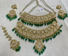 Tyaani inspired Green and Gold Indian / Pakistani Jewellery Set - Choker Necklace and Earrings. Sabyasachi inspired. PACHI KUNDAN (gold plated) We have a large inventory - message us what shade you are looking for or send picture of your outfit to match. Fast shipping - Canada & USA "Life is better ... with a Touch of Elegance". Message for any questions. Kundan Bridal Set, Wedding Jewelry Indian, Usa Life, Green Gold Weddings, Pakistani Jewellery, Barbie Dollhouse, Gold Wedding Jewelry, Pakistani Jewelry, Indian Wedding Jewelry