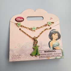 the disney princess necklace and earring set is in its box with it's packaging