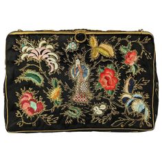 Elegant Chinese Embroidered Evening Bag mounted in the UK. Lovely antique silk satin textile finely embroidered with figures and metallic lame thread accents. Enamel decorated and glass beaded frame. 1950's, Mounted in the UK. 9.5" x 6" x 1" with 6" chain handle drop. Beaded Frame, Chinese Embroidered, Bead Frame, Bead Embroidery, Beaded Embroidery, Fashion Handbags, Silk Satin, Evening Bags, The Uk