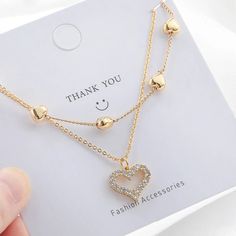 2024 Fashion New Gold Color Double Layer Heart Necklace For Women Clavicle Chain Elegant Charm Wedding Pendant Jewelry Necklace Type: Pendant Necklaces Material: Rhinestone Gender: Women Model Number: dfw532 Style: TRENDY Shape\pattern: HEART Pendant Size: 1-5cm Fine or Fashion: fashion Occasion: Party Chain Type: None Item Type: NECKLACES Compatibility: All Compatible Choice: yes semi_Choice: yes Heart-shaped Alloy Necklaces For Mother's Day, Mother's Day Heart Pendant Alloy Necklace, Alloy Chain Jewelry For Wedding, Elegant Alloy Chain Necklace For Wedding, Wedding Alloy Jewelry With Chain Detail, Wedding Alloy Chain Jewelry, Elegant Alloy Heart Pendant Necklace, Valentine's Day Heart Necklace With Clavicle Chain For Parties, Elegant Alloy Necklace For Valentine's Day