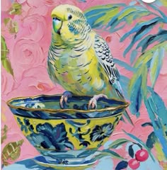 a painting of a yellow parakeet perched on a bowl