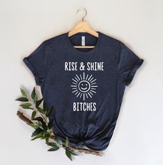 "------ CUSTOMIZE YOUR OWN ITEM ------ Rise and Shine Bitches Shirt, Sleeve Unisex T-Shirt , Funny Shirts, Women Shirts, Sarcastic Shirt, Summer Shirt, Graphic T-Shirt, Christian ------ CHOOSE YOUR SHIRT COLOR, SIZE, AND QUANTITY. ------ 1. Select the size 2. Select the primary color 3. Click \"add to cart\" and then return to the listing for each family member. 4. Add a note to seller when checking out with any special requests ------ SHIRT COLORS ------ White, Black, Deep Heather, Pink, Heathe Shina Twain Shirts, Snarky Shirts For Women, Funny Tri-blend T-shirt With Screen Print, Funny Summer Shirt, Pre-shrunk, Relaxed Fit Pre-shrunk Bookish T-shirt, Brides Babes, Honeymoon Shirts, Funny Shirts Women, Bridesmaid Shirts