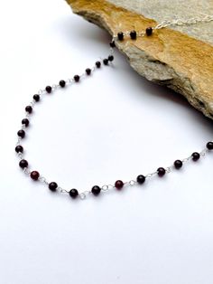 "Garnet necklace. -4mm Garnet beads. -Sterling silver wire. -Sterling silver lobster clasp. Necklace length is 16, 18, 30, 22\"  + 3 inches sterling silver extended chain. Garnet is a stone of prosperity and abundance, encouraging gratitude and service to others.  Note: Since the beads are natural and unique, beads may not have the same pattern for every single beads with the provided sample pictures. Please be understanding. Thanks a lot! **Custom orders welcome." Beaded Necklaces With Sterling Silver Clasp As Gift, Gift Beaded Necklaces With Sterling Silver Clasp, Sterling Silver Beaded Necklace Gift, Beaded Necklace With Sterling Silver Clasp As Gift, Service To Others, Prosperity And Abundance, Single Bead, Clasp Necklace, Garnet Necklace