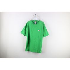 Vintage 90s Tommy Hilfiger Mens Medium Spell Out Box Logo Short Sleeve T-Shirt Mens T-Shirt Color fade Mens size Medium Measurements are: 22 inches underarm to underarm 29.5 inches top to bottom Green Cotton US Shipping is FREE Canada is $15 and International is $24 Check out my other items in my store! X326 Green 90s Style T-shirt For Summer, Green Crew Neck Shirt For Streetwear, Retro Green T-shirt For Streetwear, 90s Green Short Sleeve Tops, Green Retro T-shirt For Streetwear, 90s Green Tops With Letter Print, 90s Green Letter Print Tops, 90s Green T-shirt For Streetwear, 90s Style Green T-shirt For Streetwear